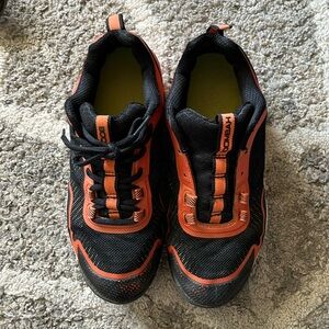 Boombah black and orange molded woman’s size 7 cleats